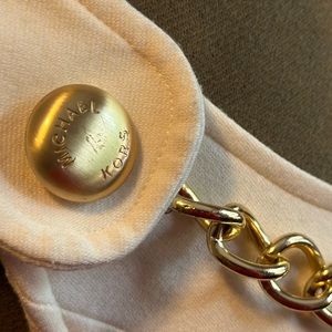 POCKETS! Lovely, creamy white with gold accents. Lined with cotton.